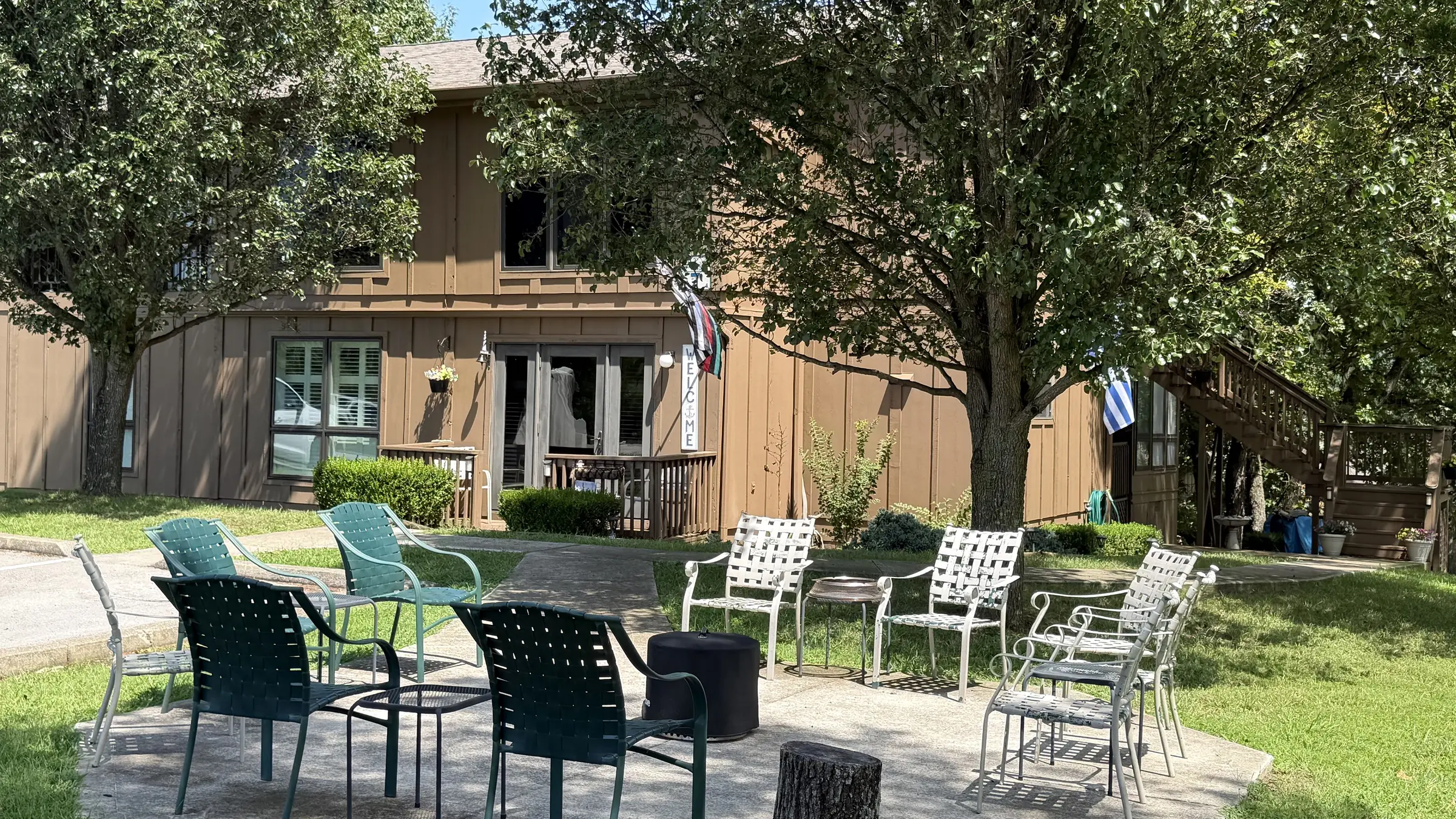 Outdoor seating area beside the condo